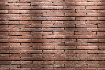 Brick wall texture pattern or brick wall background for interior or exterior design with copy space for text or image. Dark edged.