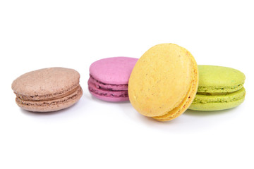 French colorful macarons isolated on white. Tasty, diet, gourman