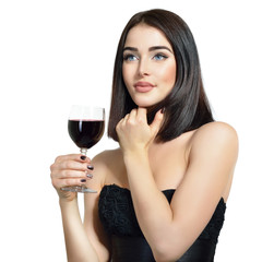 Portrait of beautiful young woman with glass of wine, over white