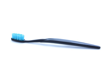 Black toothbrush on white background