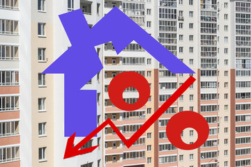 Red percent sign on the background of houses . The concept of price changes on the real estate market .