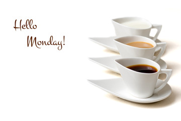 hello monday concept with three coffee cups