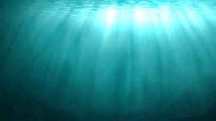 Obraz premium Underwater background with rays of sunlight shining down through the water surface. At the bottom, a rocky ocean floor is visible.