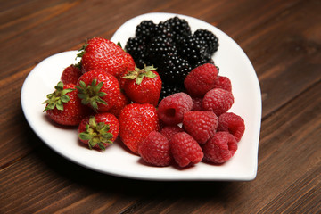 Healthy food on wooden table. Heart health concept