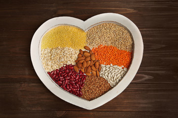 Healthy food on wooden table. Heart health concept