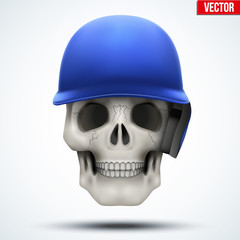 Human skull with baseball helmet