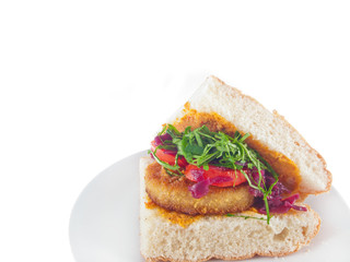 vegan bread with breaded spiced tofu, mashed eggplant and carrot spread and vegetables