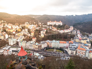 Naklejka premium Aerial view of Karlovy Vary with spa, residential buildings and hotels in the valley of river Tepla, Czech Republic