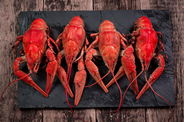 fresh boiled crawfish on the old wooden background
