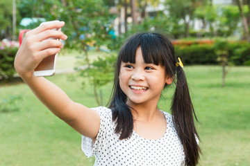 Girl selfie at garden.