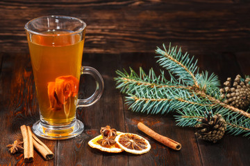 Compote of dried fruits with ingridients on dark rustic wooden background