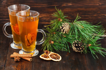 Compote of dried fruits with ingridients on dark rustic wooden background