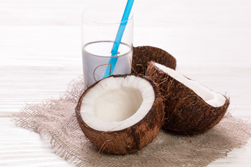 Coconut on wooden table.
