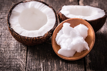 Coconut on wooden table.Vintage filter. Organic healthy food concept.Beauty and SPA concept.