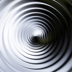 Abstract background of concentric swirling circles creating an illusion of movement. Black and white rotating background resembling 
molten metal