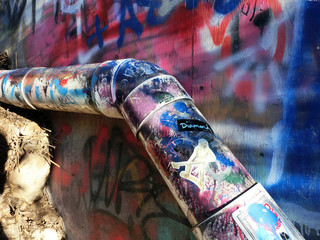 Urban PVC pipe with spray painted graffiti colors