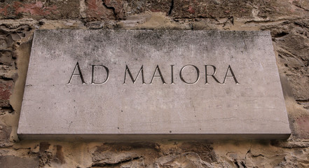 Ad maiora. A Latin phrase meaning Towards greater things.