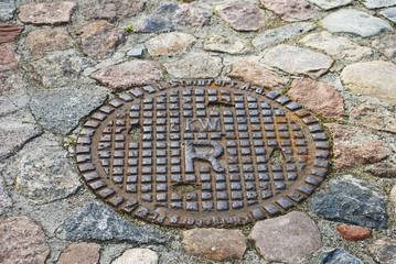 Cover of an old sewer manhole in Kaliningrad