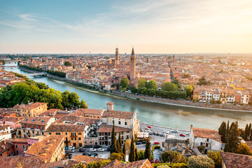 Fototapeta na wymiar Panoramic aerial view on Verona old town from the castle hill on the sunset