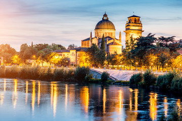 Fototapeta na wymiar View on saint George church from Stone bridge in the evening in Verona city