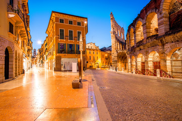 Fototapeta na wymiar Night view on illuminated Bra square with Arena in Verona city