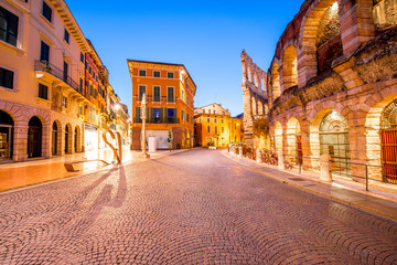 Night view on illuminated Bra square with Arena in Verona city