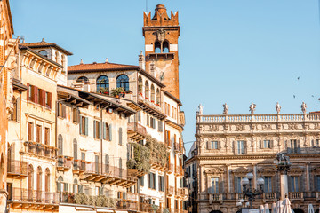 Buildings with Gardello tower on Erbe square in Verona city