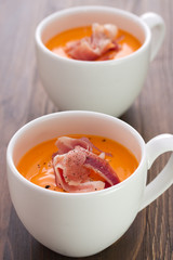 cold soup with smoked meat and black pepper in white cup