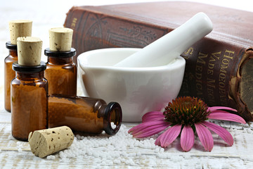 homeopathic echinacea pills on wooden background - obrazy, fototapety, plakaty