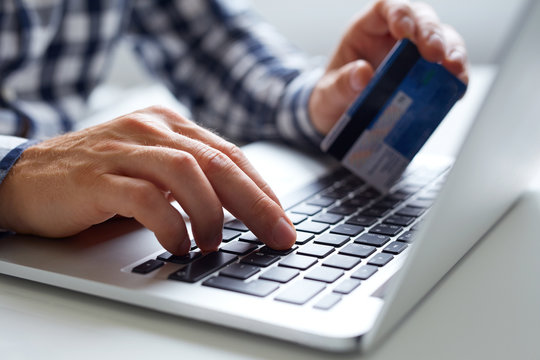 Man inserts data for online payments