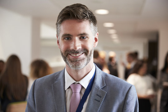 Portrait Of Male Delegate During Break At Conference