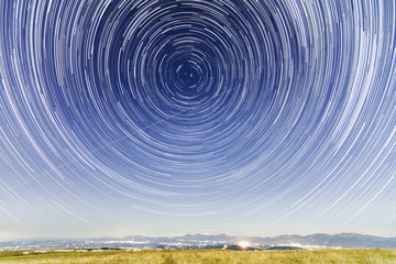 Night star trail from the top of a mountain