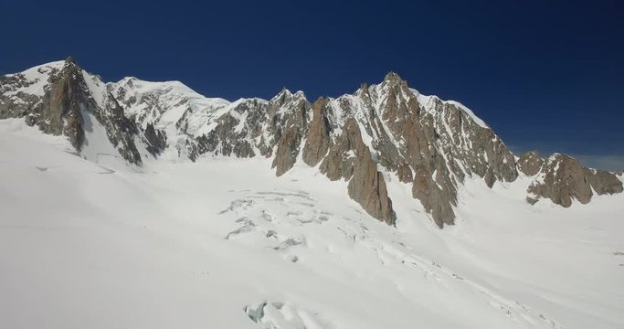 Glacier du Geant with Mont Blanc. Petit and Grand Capucin. Mount Maudit. Mont Blanc du Tacul summits. Mont Blanc Massif. Italy