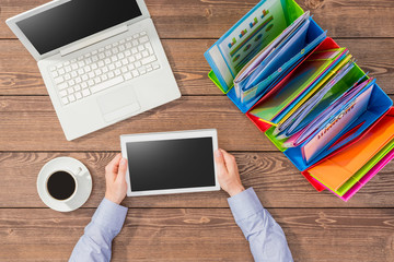 Business man using tablet in an office