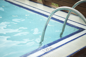 Outdoor swimming pool in summer