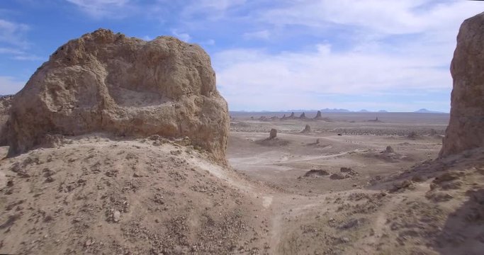 Flight Desert Rock Structures / Multiple clips of flying by rock structures in the desert.