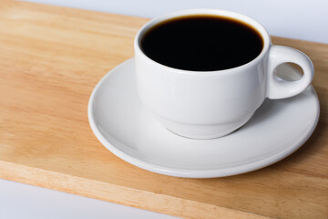 White Cup of Coffee on Wooden