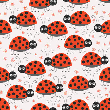 seamless pattern with ladybirds and flowers