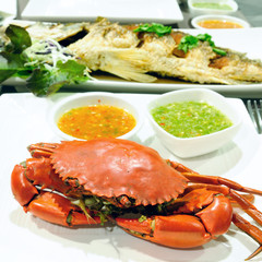 Sea crab and snapper seafood set with spicy sauce