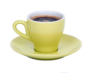 Black coffee in green cup on saucer separated on white background