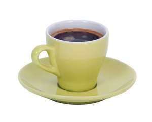 Black coffee in green cup on saucer separated on white background