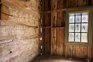 Fototapeta na wymiar Inside of Old Abandoned House with Window.