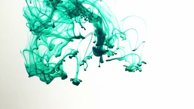 Green Ink Mixing With Red Ink In Water, in 50 fps.