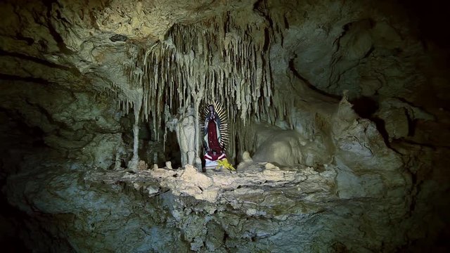 Underwater stalactites and stalagmites in landscape Mexican Sacred Mayan Cenote. Deep underground clean and clear fresh lake in cave. Unique shooting Wonders of Yucatan Peninsula nature in Dos Ojos.