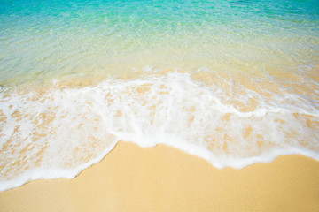 Wave of the sea on the sand beach