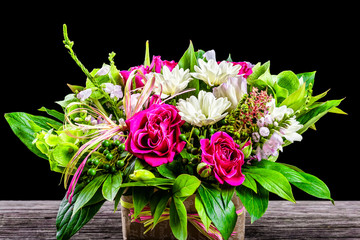 wedding bouquet with roses and white gerberas, close-up