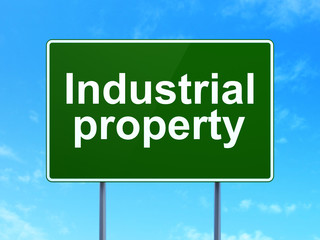 Law concept: Industrial Property on road sign background