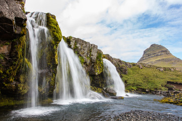 Kirkjufellsfoss waterfall near the Kirkjufell mountain