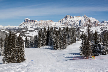 View of the Alpe di Fanes cliffs in winter, with the peaks Conturines and Piz Lavarella, Alta Badia, Italian Dolomites.