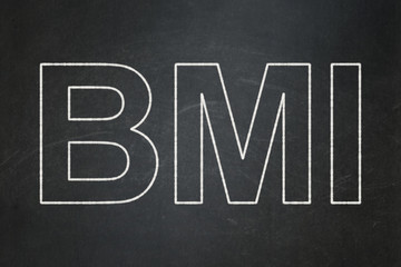 Health concept: BMI on chalkboard background